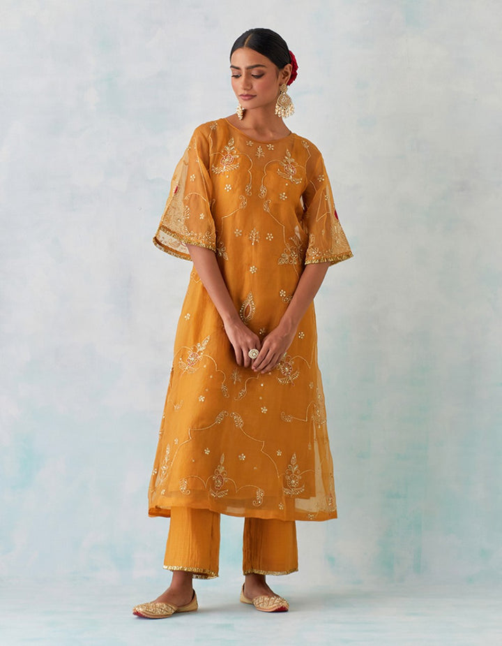 Mustard hand embroidered tissue organza and chanderi lining kurta with pants