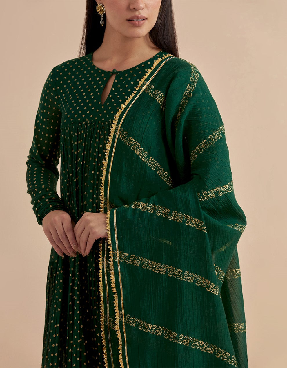 Green printed chanderi silk tiered kurta with churidar and dupatta