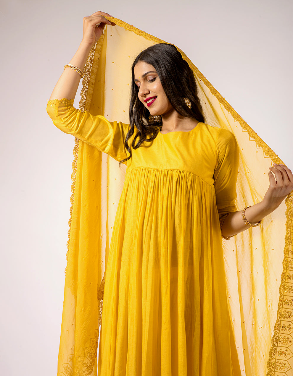 Yellow-muslin-cotton-anarkali-with-churidar-and-scalloped-embroidered-tissue-dupatta