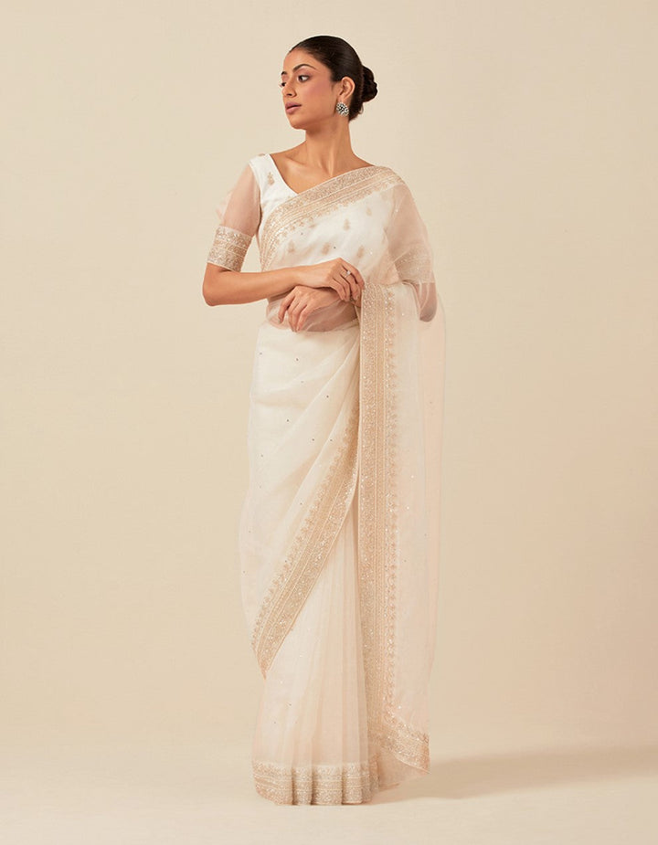 White organza hand work blouse and saree with satin petticoat