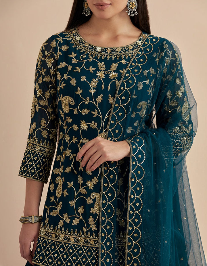 Teal blue hand embroidered georgette kurta with skirt and net dupatta