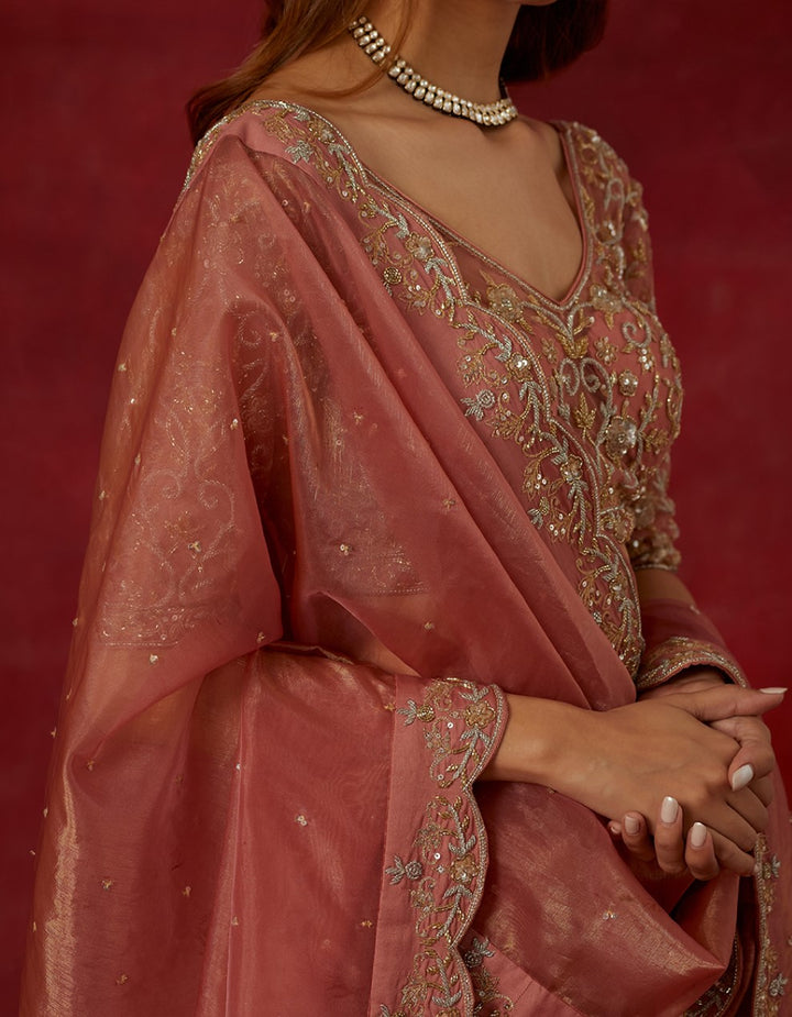 Dust Pink embroidered chanderi silk skirt and net blouse with tissue dupatta