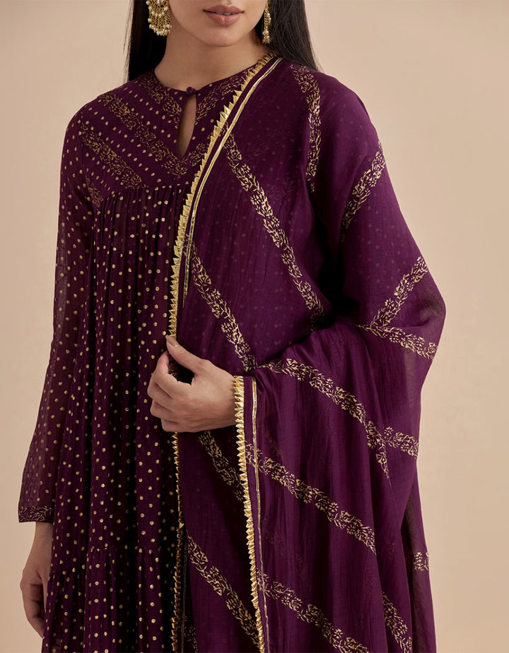 Purple printed chanderi silk tiered kurta with churidar and dupatta