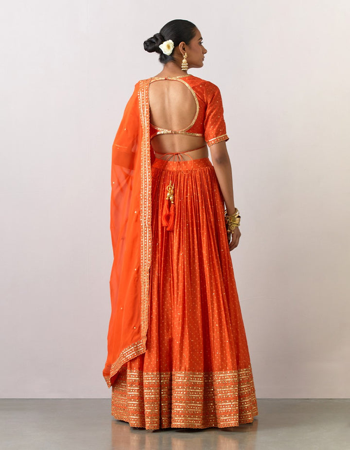 Orange embroidered printed  chanderi blouse with skirt and organza dupatta
