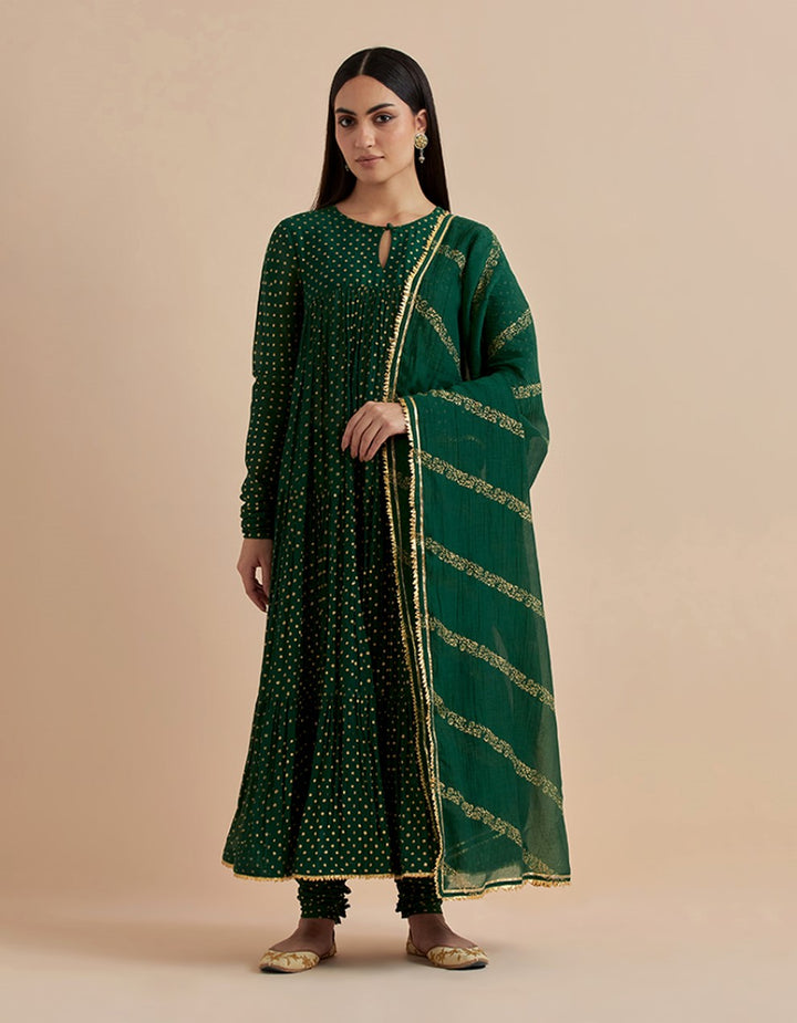 Green printed chanderi silk tiered kurta with churidar and dupatta