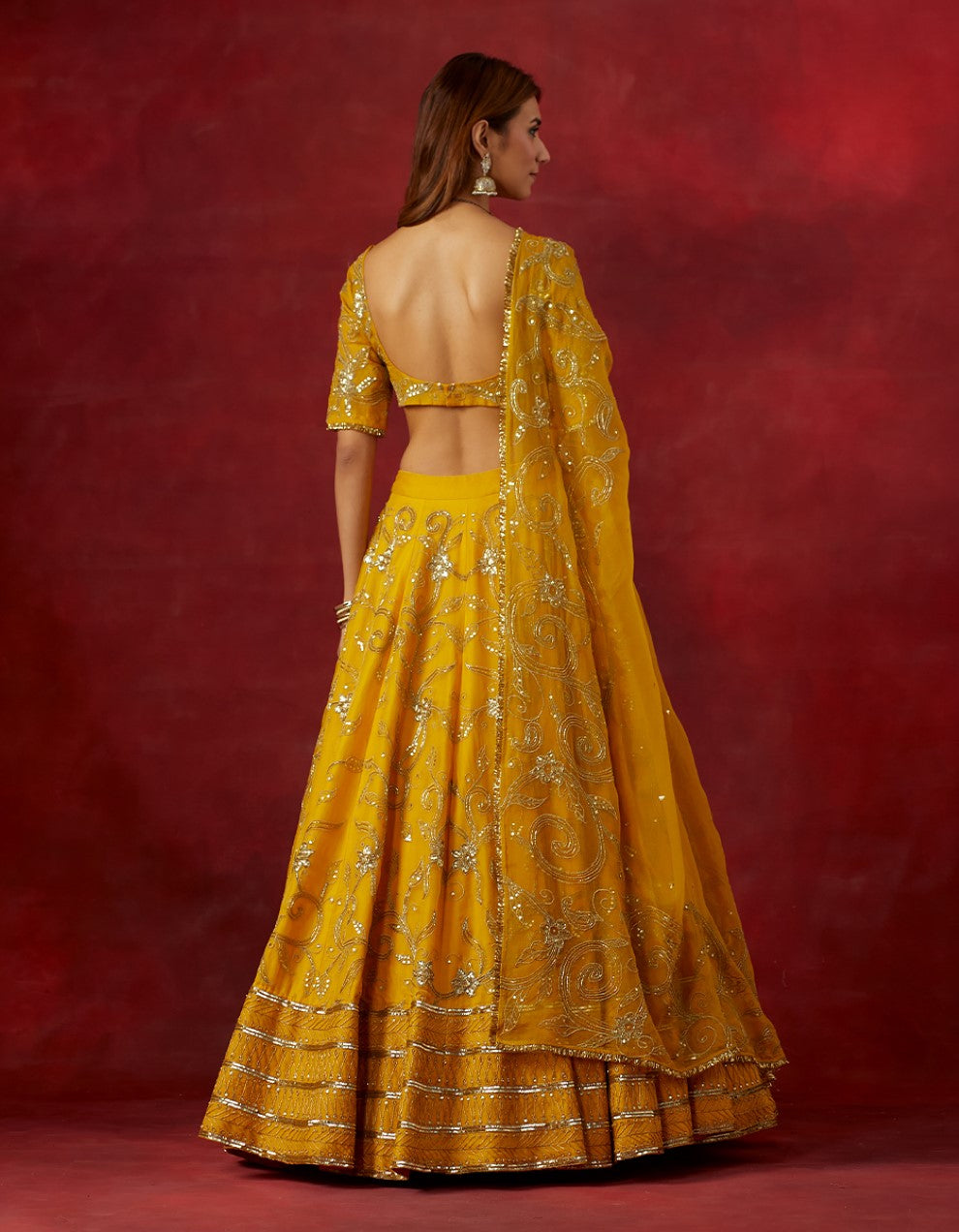 Yellow embroidered chanderi silk blouse and skirt with organza dupatta
