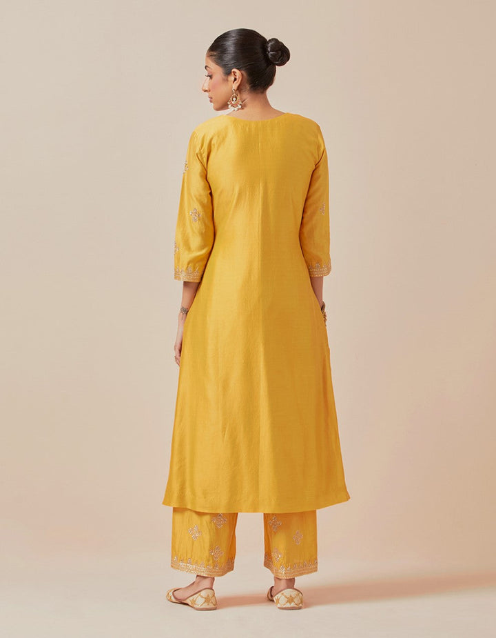 Yellow hand embroidered kurta with pants and dupatta