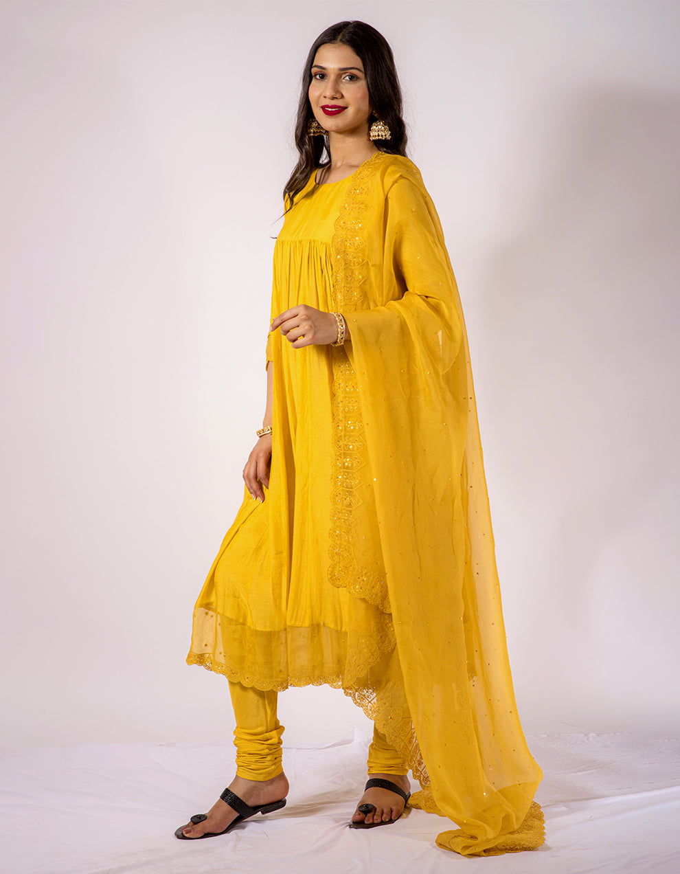 Yellow-muslin-cotton-anarkali-with-churidar-and-scalloped-embroidered-tissue-dupatta