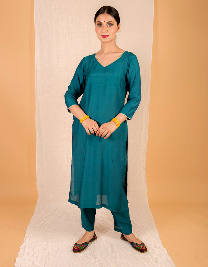 teal-blue-straight-cut-kurta-with-pants-and-a-golden-muslin-dupatta